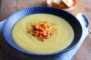 a bowl of vegan cauliflower and potato soup