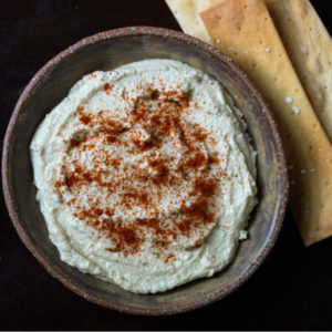 a plate of hummus