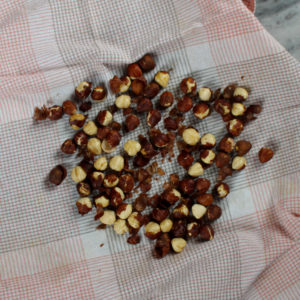 roasted hazelnuts in a towel
